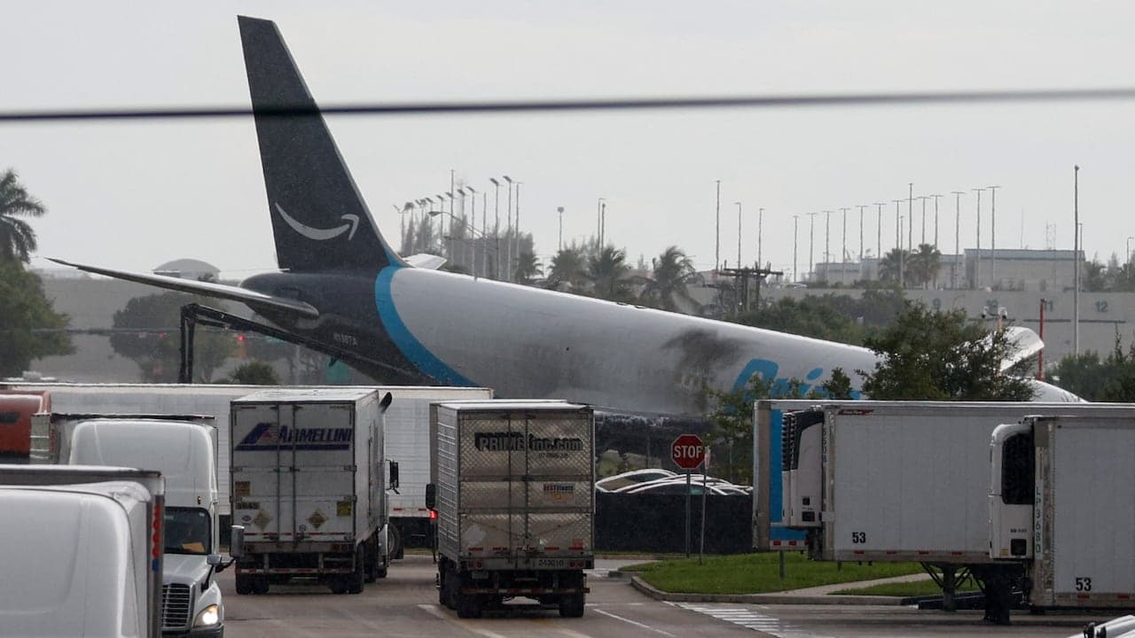At least 5 dead after Amazon cargo plane barrels off Miami runway and smashes into cars: authorities
